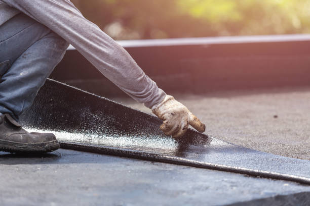 Professional Basement Waterproofing technician working in Clarksville, VA